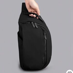 Alpaka Metro Crossbody Left Shoulder  Sling Bag Black Axoflux 210D NWT